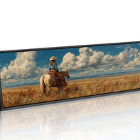 Cowgirl on Horse Overlooking Wide Western Prairie