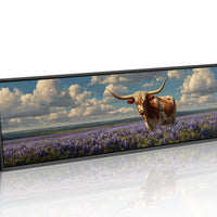 Texas Longhorn Standing in Blooming Bluebonnet Field