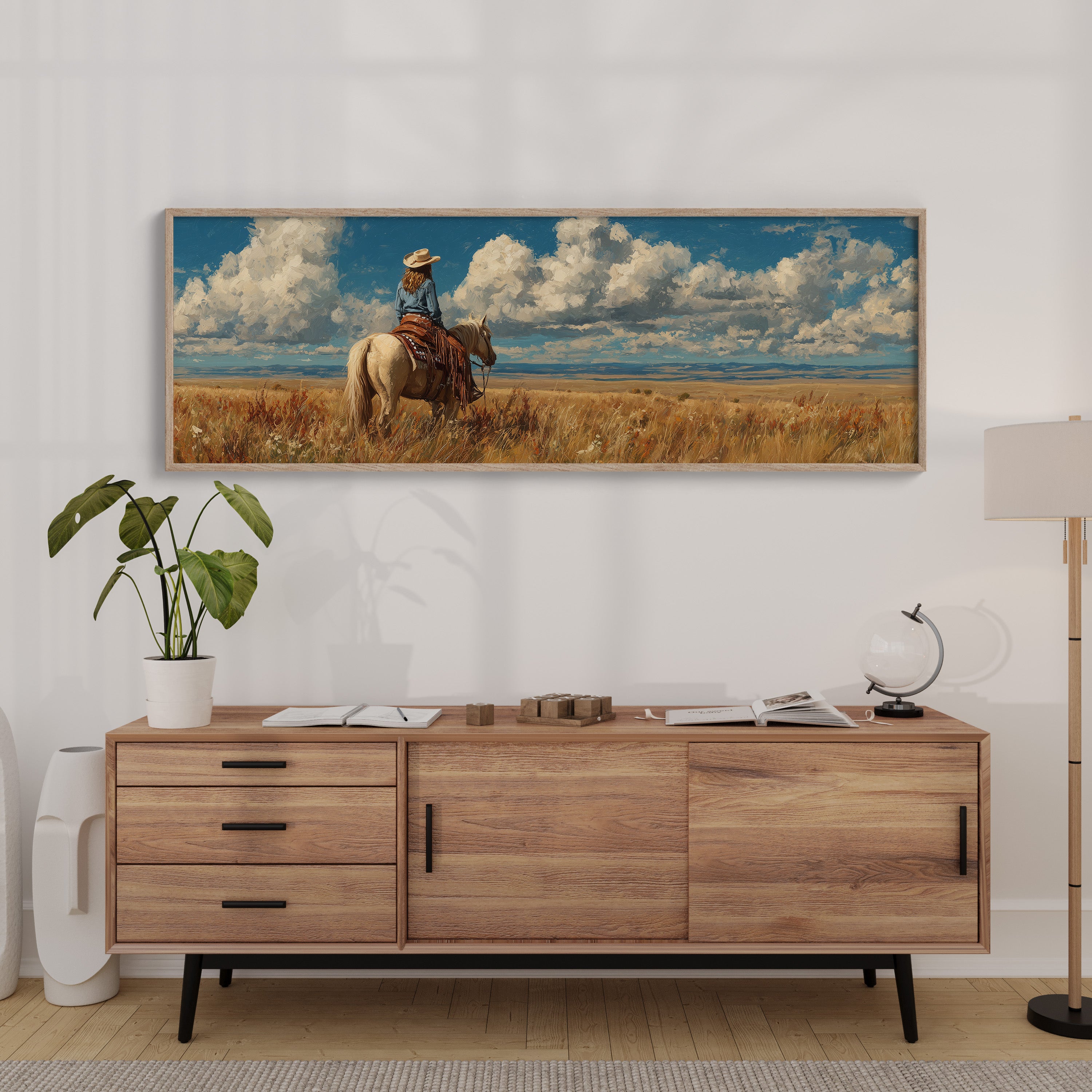 Cowgirl on Horse Overlooking Wide Western Prairie