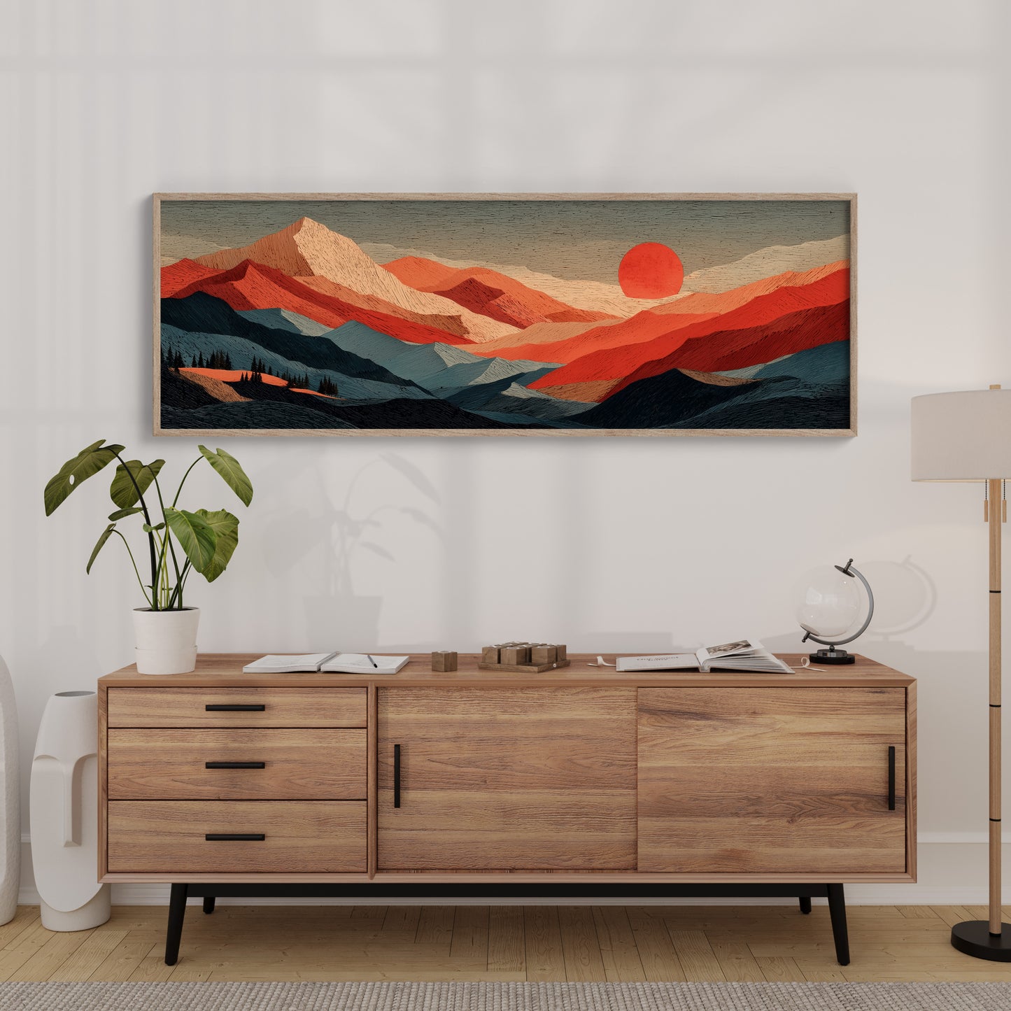 Crimson Sun Over Layered Peaks