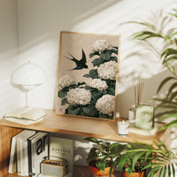 Swallow's Descent Among Snowball Blooms