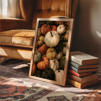 Squash Goals, Achieved, framed print leaning on a leather armchair beside a stack of books