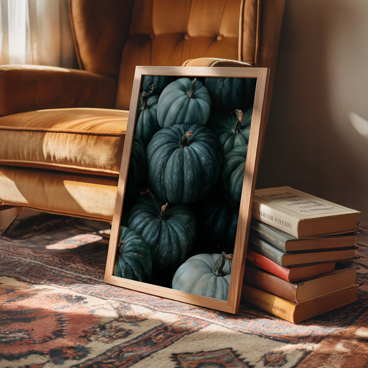 Teal Talk: Gourds Of A Feather, framed print leaning on a leather armchair beside a stack of books