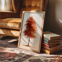 Shedding Season, No Apologies, framed print leaning on a leather armchair beside a stack of books