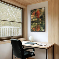 Mirror Mirror On The Pond, framed print on a white wall above a desk and black office chair