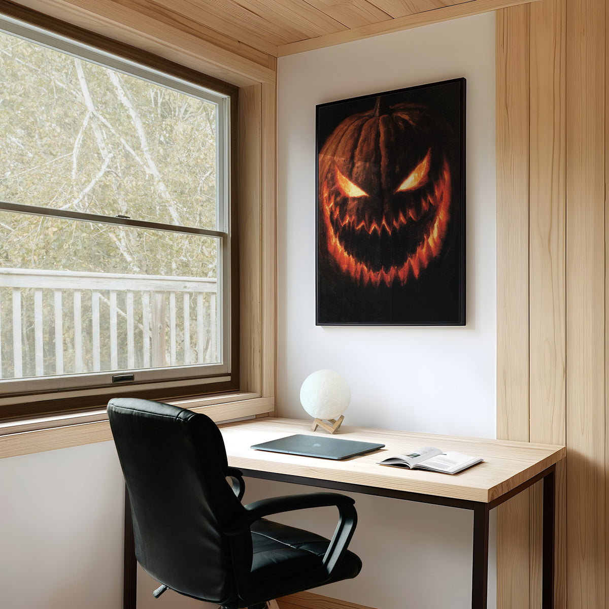Grin And Bear The Fright, framed print on a white wall above a desk and black office chair