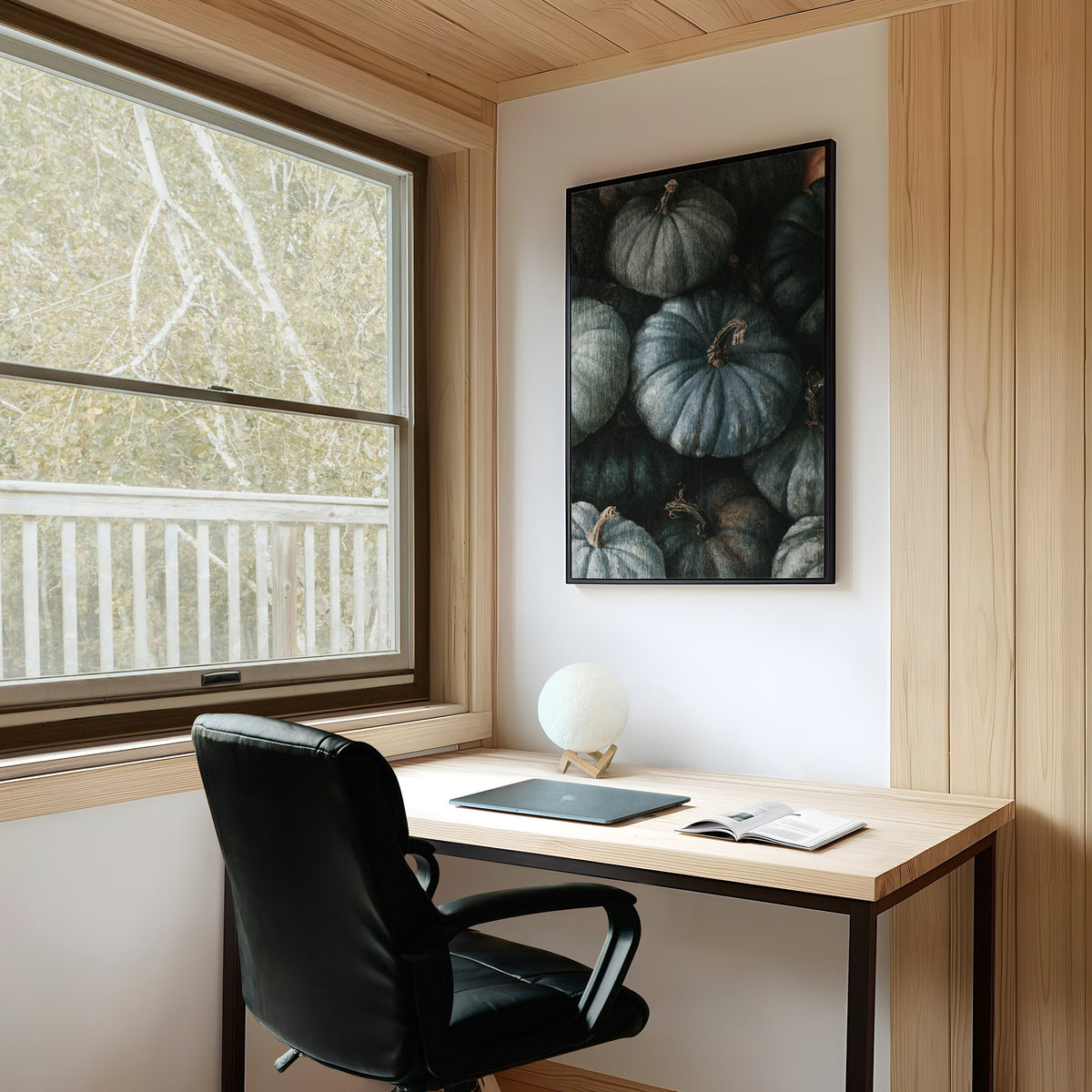 Feeling A Little Blue kin, framed print on a white wall above a desk and black office chair