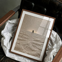 Robed Figure Facing Ocean Horizon