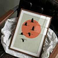 Cranes Across a Red Sun
