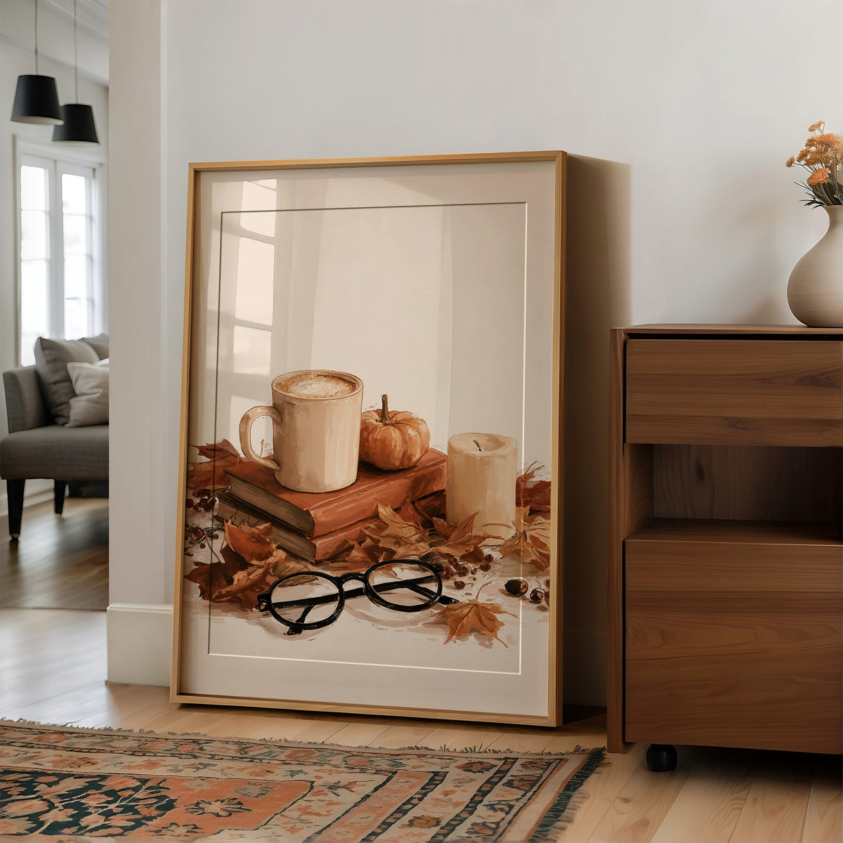 Read Between The Latte Lines, large framed print leaning on a white wall beside a wood cabinet