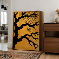 Just Hanging Around, Spookily, large framed print leaning on a white wall beside a wood cabinet