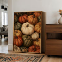 Crowded House, Gourd Edition, large framed print leaning on a white wall beside a wood cabinet