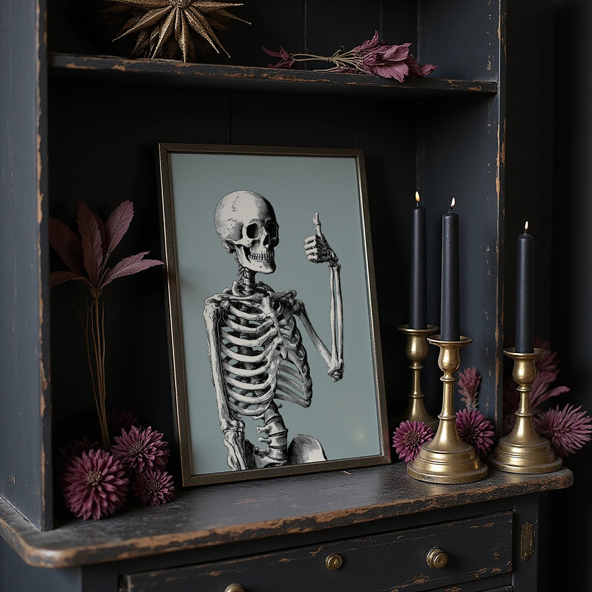 Bone Voyage, You’ve Got This, large framed print leaning on a white wall beside a wood cabinet
