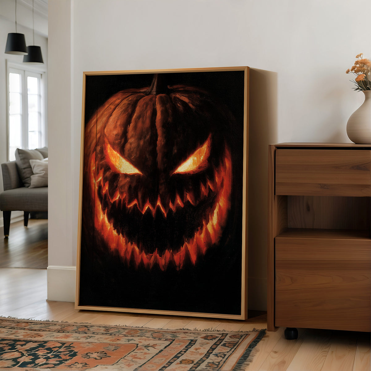 Grin And Bear The Fright, large framed print leaning on a white wall beside a wood cabinet