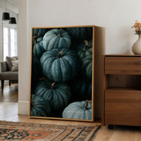 Teal Talk: Gourds Of A Feather, large framed print leaning on a white wall beside a wood cabinet
