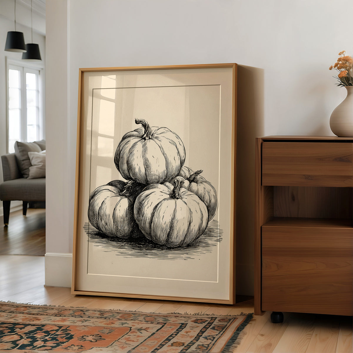 Top Gourd Takes The High Ground, large framed print leaning on a white wall beside a wood cabinet