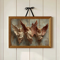 Three Carved Angels on Strings
