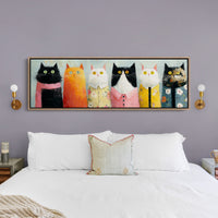 Dressed-Up Cats in a Row