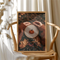Sew Gourd, Sew Gourd, framed print resting on a wooden chair beside sheer curtains