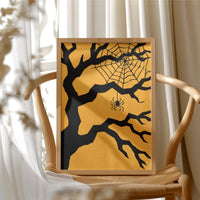 Just Hanging Around, Spookily, framed print resting on a wooden chair beside sheer curtains