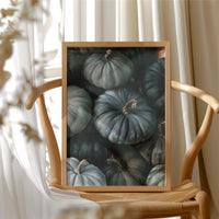 Feeling A Little Blue kin, framed print resting on a wooden chair beside sheer curtains