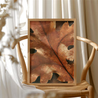 Vein Glory, framed print resting on a wooden chair beside sheer curtains