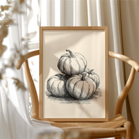 Top Gourd Takes The High Ground, framed print resting on a wooden chair beside sheer curtains