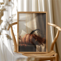 Window Seat Reserved For One Gourd, framed print resting on a wooden chair beside sheer curtains