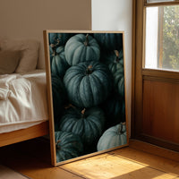 Teal Talk: Gourds Of A Feather, framed print leaning beside a bed in a sunlit bedroom