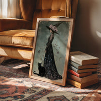 Bloom, Broom, And Feline Backup, framed print leaning beside a bed in a sunlit bedroom